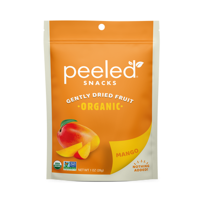 Peeled Snacks Gently Dried Organic Mango packaging featuring a bright orange and white pouch with a vibrant mango illustration, USDA Organic and Non-GMO Project Verified seals, and "Nothing Added!" text on a white background