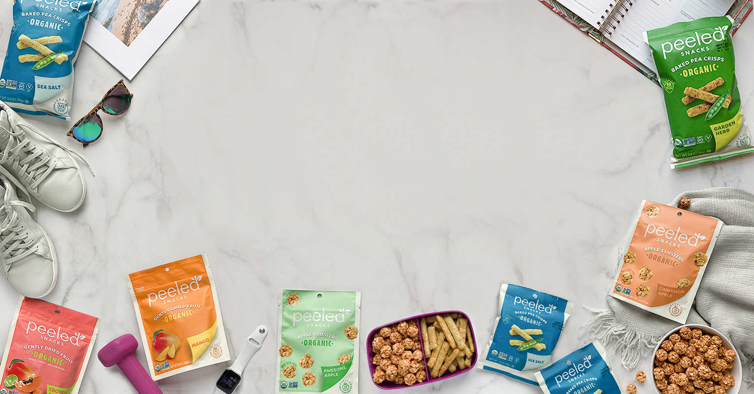 bags of peeled snacks with lifestyle objects
